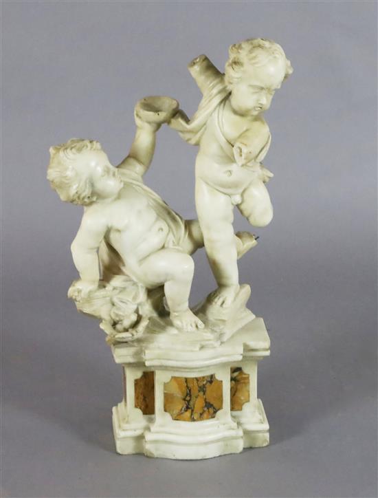 A 19th century Italian carved white marble group of two putti, height 25in.